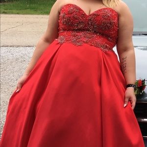Red strapless prom gown